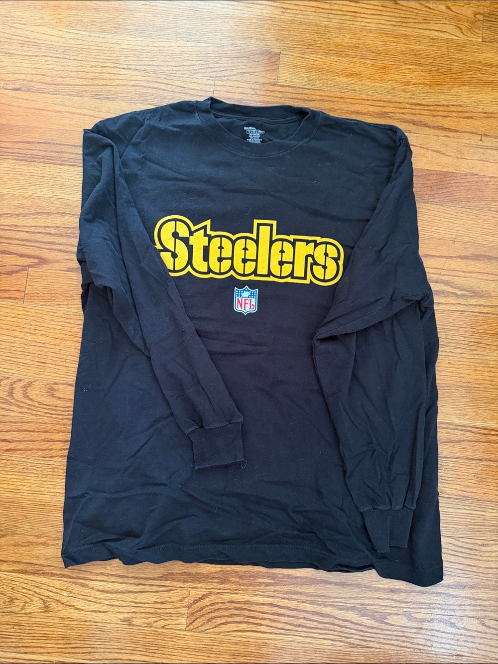 Pittsburgh Steelers Reebok Black Long-Sleeve Logo Tee with Yellow Print